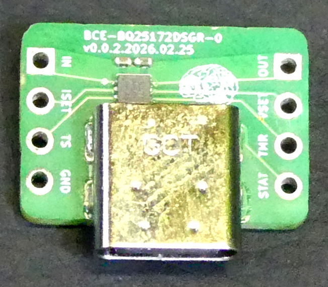 A photo of a PCB (Printed Circuit Board) with 4 prototyping holes on the left and 4 on the right. A USB-C connector is at the bottom of the board.
